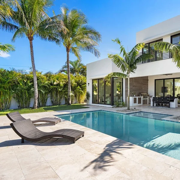 Ivory travertine tiles poolside area
